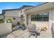 Inviting outdoor patio featuring comfortable seating and decorative plants, perfect for relaxing and enjoying the fresh air at 3401 Killdeer Pl, Palm Harbor, FL 34685