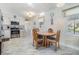Open concept kitchen and dining area with stainless appliances and lots of natural light at 37321 8Th Ave, Zephyrhills, FL 33542