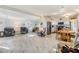 Open-concept living area showcases a spacious layout, updated flooring, and comfortable seating at 37321 8Th Ave, Zephyrhills, FL 33542