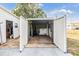 Large shed providing ample storage space with open doors revealing interior layout and organization at 37321 8Th Ave, Zephyrhills, FL 33542