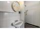 Bathroom with a shower and sink with mirror at 5538 Antigua Dr, Zephyrhills, FL 33541