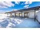 Outdoor patio featuring picnic tables and an overhang for shade at 5538 Antigua Dr, Zephyrhills, FL 33541