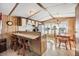 Efficient kitchen with a breakfast bar and dining table, perfect for casual meals and gatherings at 5538 Antigua Dr, Zephyrhills, FL 33541