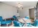 Enclosed lanai featuring comfortable seating and a ceiling fan at 5538 Antigua Dr, Zephyrhills, FL 33541