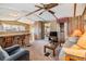 Inviting living room features a cozy bar area and comfortable seating with lots of space at 5538 Antigua Dr, Zephyrhills, FL 33541