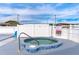 Relaxing spa featuring a soothing hot tub and a white fence for privacy at 5538 Antigua Dr, Zephyrhills, FL 33541