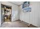 Versatile storage area or workshop space with a storage rack and adjacent storage room at 5538 Antigua Dr, Zephyrhills, FL 33541