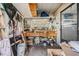 Functional workshop with ample storage and a workbench at 5538 Antigua Dr, Zephyrhills, FL 33541