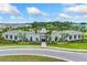 Aerial view of the community clubhouse and pool surrounded by lush landscaping at 5636 Silver Moonlight Dr, Palmetto, FL 34221