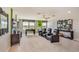 Spacious game room with comfortable seating, foosball, and stylish decor at 5636 Silver Moonlight Dr, Palmetto, FL 34221