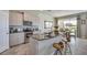 Kitchen with granite countertops, stainless steel appliances, and a breakfast bar at 5636 Silver Moonlight Dr, Palmetto, FL 34221