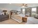 Bright main bedroom with modern furnishings, comfortable bed, and serene ambiance at 5636 Silver Moonlight Dr, Palmetto, FL 34221
