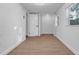 Clean bedroom with neutral paint, updated flooring, and a closet at 6326 22Nd N Ave, St Petersburg, FL 33710