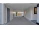 Covered carport and a grey concrete floor at 6326 22Nd N Ave, St Petersburg, FL 33710