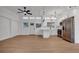 Spacious living room with hardwood floors, open floor plan and ceiling fan at 6326 22Nd N Ave, St Petersburg, FL 33710