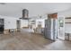 Modern kitchen featuring stainless steel appliances, tile flooring, and a sleek range hood at 6345 Tanglewood Ne Dr, St Petersburg, FL 33702