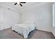 Minimalist bedroom with tray ceiling, plantation shutters, and neutral color scheme at 724 Winterside Dr, Apollo Beach, FL 33572