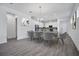 The dining area sits next to the kitchen and has a table with seating for six at 724 Winterside Dr, Apollo Beach, FL 33572