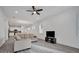 Bright living room featuring an open floor plan and a neutral color palette at 724 Winterside Dr, Apollo Beach, FL 33572