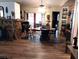 Vintage style dining room is adjacent to a living room with wood-look floors at 7608 Chenkin, Zephyrhills, FL 33540