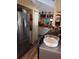 Kitchen area with stainless steel appliances, butcher block countertops, and ample storage at 7608 Chenkin, Zephyrhills, FL 33540