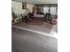 Inviting living room features eclectic decor, unique furnishings, and warm colors at 7608 Chenkin, Zephyrhills, FL 33540