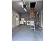 Functional garage equipped with laundry appliances, a utility sink, and ample storage space at 8139 38Th N Ave, St Petersburg, FL 33710