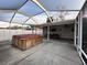 Spacious screened patio complete with a hot tub and an outdoor dining area at 8139 38Th N Ave, St Petersburg, FL 33710