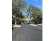 Gated community entrance with landscaped islands at 8541 Hunters Key Cir, Tampa, FL 33647