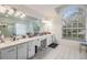 Large bathroom with double vanity, garden tub, and separate shower at 9318 Heritage Oak Ct, Tampa, FL 33647