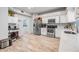 Well-equipped kitchen with stainless steel appliances, white cabinets, and plenty of counter space at 9318 Heritage Oak Ct, Tampa, FL 33647
