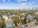 Stunning aerial view of residential neighborhood with skyline in background at 1045 6Th N St, St Petersburg, FL 33701