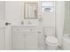 This bathroom has a shower-tub combo and a vanity with gold hardware at 10925 124Th Ave, Largo, FL 33778