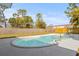 The backyard features a private pool and is surrounded by well-maintained fencing at 10925 124Th Ave, Largo, FL 33778