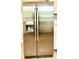 Stainless steel refrigerator with water dispenser, offering modern convenience and ample storage at 1101 Canal St, Ruskin, FL 33570