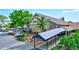 Exterior view of the auditorium, with well-maintained landscaping and a covered entrance at 1487 Dundee Dr, Palm Harbor, FL 34684