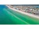 Aerial view of the beachfront condo and beautiful ocean with beach at 17200 Gulf Blvd # 302, North Redington Beach, FL 33708