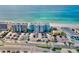 Aerial shot showcases the condo's proximity to the beach, parking and nearby amenities at 17200 Gulf Blvd # 302, North Redington Beach, FL 33708