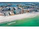 Beautiful aerial view of the beachfront condo, with white sand beach and emerald gulf waters at 17200 Gulf Blvd # 302, North Redington Beach, FL 33708