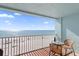 Enjoy the ocean breeze and sunshine from the balcony with table and chairs at 17200 Gulf Blvd # 302, North Redington Beach, FL 33708