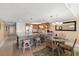 Kitchen and dining area with pendant lights and island at 17200 Gulf Blvd # 302, North Redington Beach, FL 33708