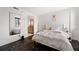 Bedroom featuring black marble floors and a glimpse into the en suite bathroom at 201 W Laurel St # 909, Tampa, FL 33602