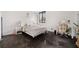 Bright bedroom featuring black marble floors, a large window, and desk area at 201 W Laurel St # 909, Tampa, FL 33602