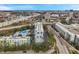 High-angle shot of the condo building showing an outdoor pool next to a highway in a bustling city at 201 W Laurel St # 909, Tampa, FL 33602