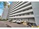 A well maintained exterior parking space with partial garage and a large building in view at 201 W Laurel St # 909, Tampa, FL 33602