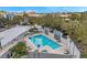 Aerial view of a condominium complex featuring an outdoor swimming pool and recreation area at 201 W Laurel St # 909, Tampa, FL 33602