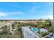 Aerial view of a rooftop pool and lounging area, perfect for relaxation and entertainment at 201 W Laurel St # 909, Tampa, FL 33602