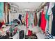 Walk-in closet offers ample storage with shelving, rods, and space for organizing clothes and accessories at 201 W Laurel St # 909, Tampa, FL 33602