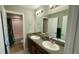 Bathroom features a double vanity and lots of space for storage at 21211 Southern Charm Dr, Land O Lakes, FL 34637