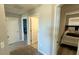 Hallway featuring multiple doorways leading to bedrooms at 21211 Southern Charm Dr, Land O Lakes, FL 34637